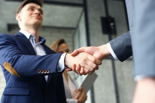 Business people shaking hands, finishing up a meeting