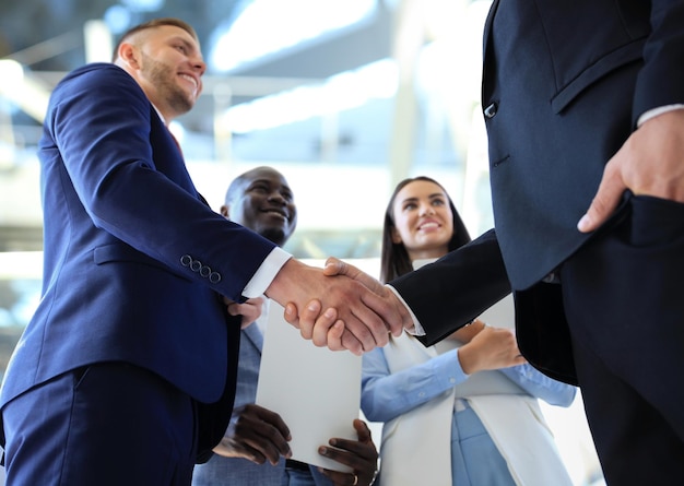 Business people shaking hands finishing up a meeting