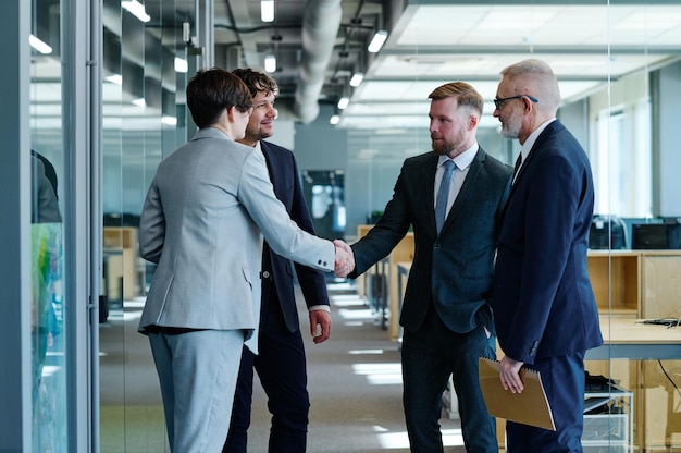 Business people shaking hands at meeting