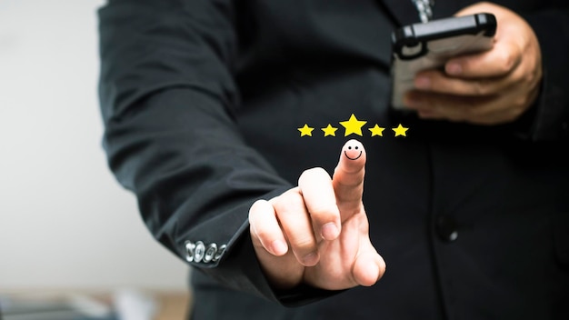 Business people thumb up positive thinking score a list of smile and stars for satisfaction on mobile service, online transactions, network performance, customer satisfaction.