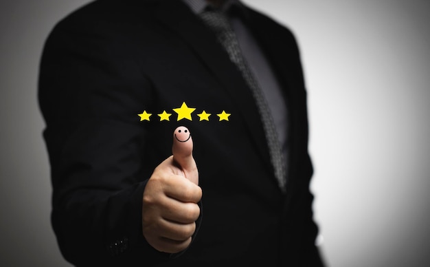 Business people thumb up positive thinking score a list of smile and stars for satisfaction on mobile service, online transactions, network performance, customer satisfaction.