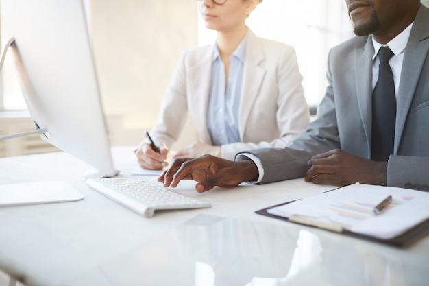 Business People using Computer Close up