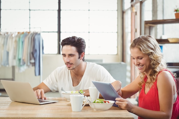 Business people using technologies in office