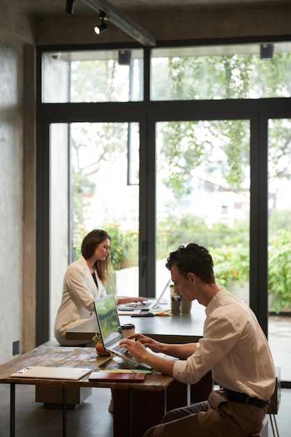 Business People Working in Cafe