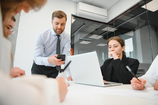 Business people working on project in office