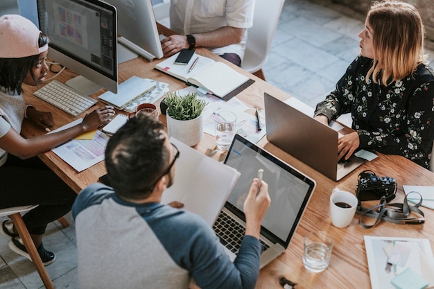 Business people working together using digital devices