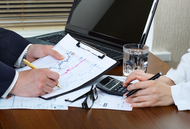 Photo business people working with business documents in the office.