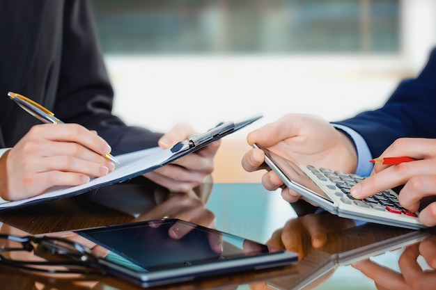 Business people working with business documents in the office.