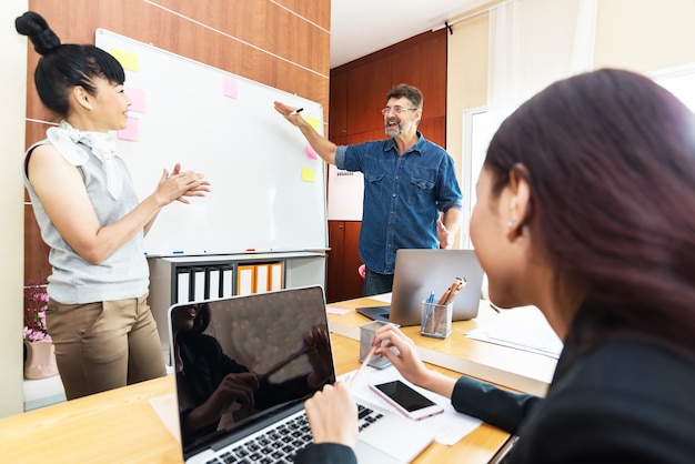 Business people working with financial plan at office