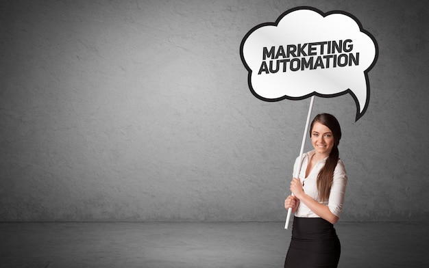 Photo business person in casual holding road sign