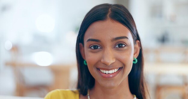 Business portrait and woman with smile in office for creative agency confidence and pride in workplace Face person and employee with happiness at company or work for startup growth and career