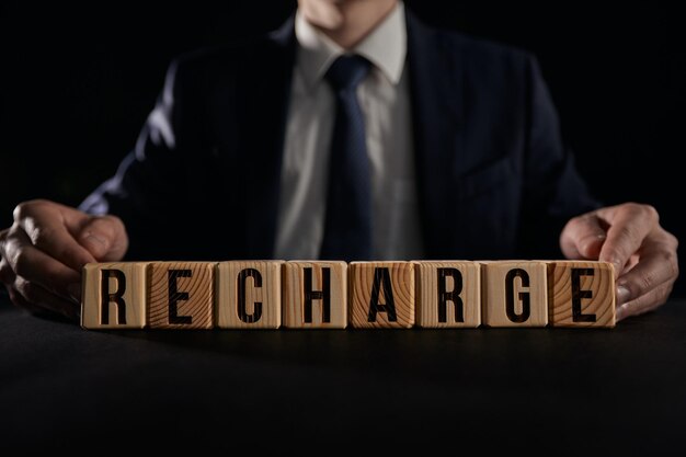 Business recharge or recharge concept on black background