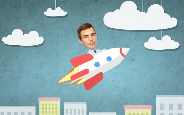 business, startup, development and people concept - businessman flying on rocket above cartoon city