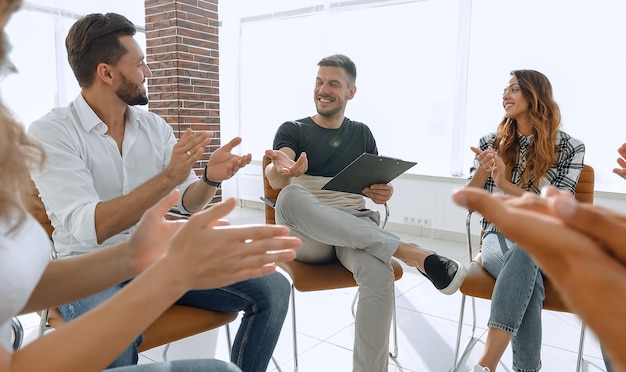 Business team applauding its project Manager