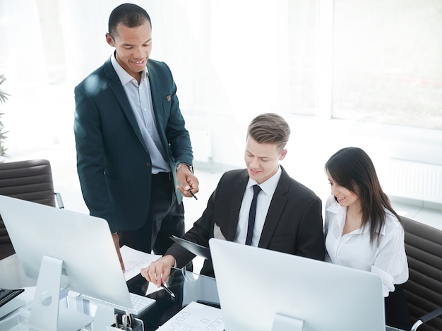 Business team discussing business documents in the workplace