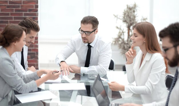 Business team discussing business documentsthe concept of a startup