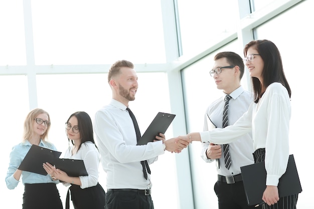 Business team and handshake of employees before the business meeting