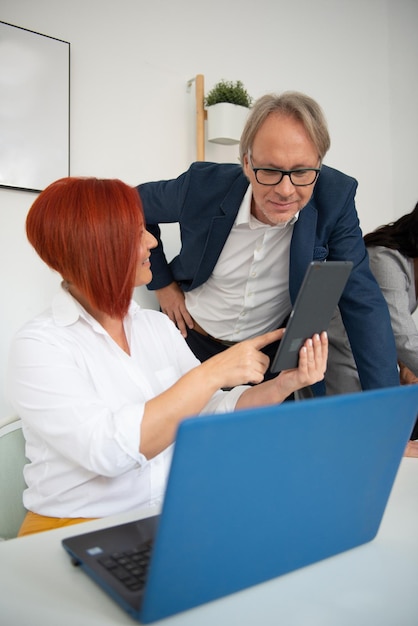 Business team of men and women in an office