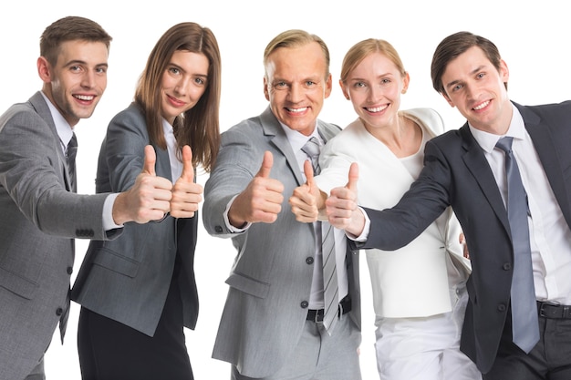 Business team showing thumb up isolated on white surface