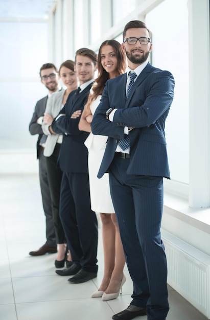 Business team standing in the officethe concept of teamwork