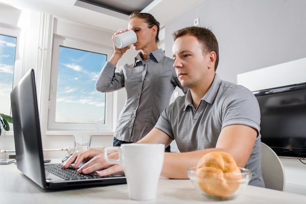 Business team working on laptop