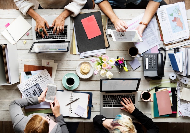 Business team working at workspace in aerial view