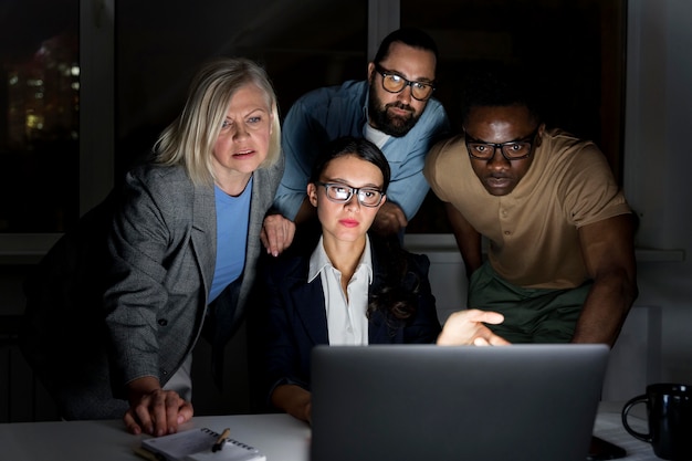 Business teammates working late at the office