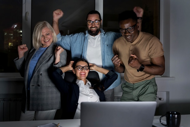 Business teammates working late at the office