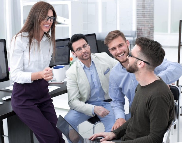 Business woman and business team talking during work break