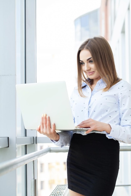 Business woman Business woman busy working on laptop computer at office