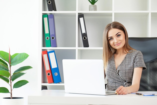 Business woman Business woman busy working on laptop computer at office