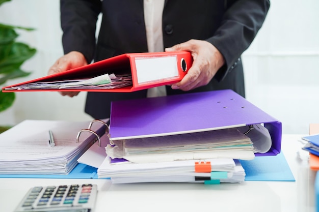 Business woman busy working with documents in office