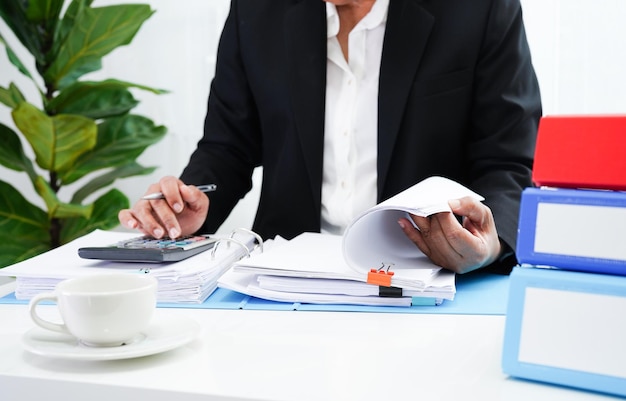 Business woman busy working with documents in office