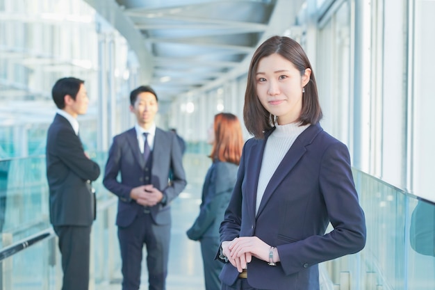 Business woman and colleagues