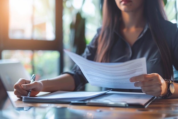 Business woman at a desk reviewing a comprehensive home insurance policy modern office background high clarity