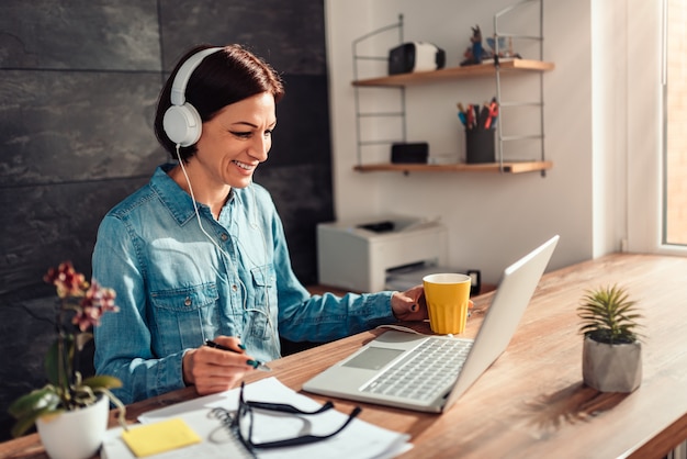 Business woman doing video call at office