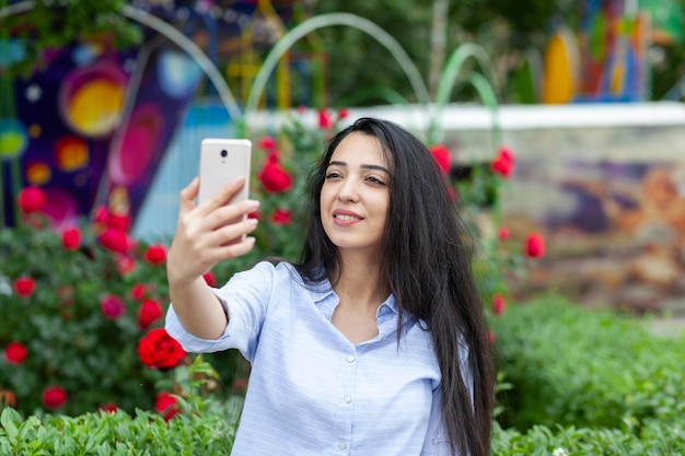 Business woman hand phone in selfie