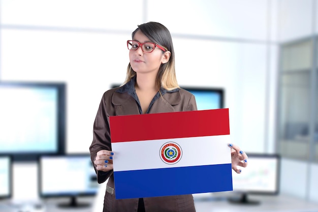 Business Woman Holding Paraguay Flag