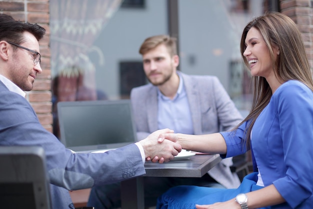 Business woman at an informal meeting concept of partnership