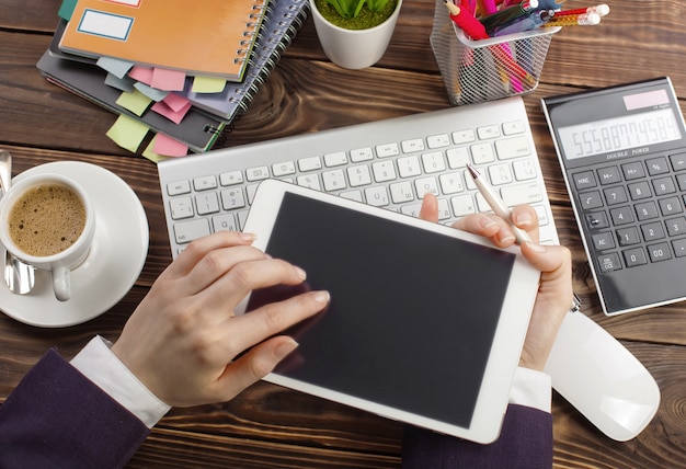 Business woman is working with business documents in the office.