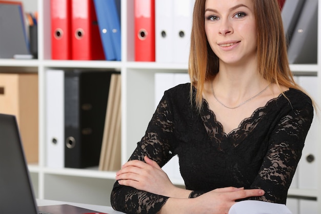 Business woman looking at computer monitor in office