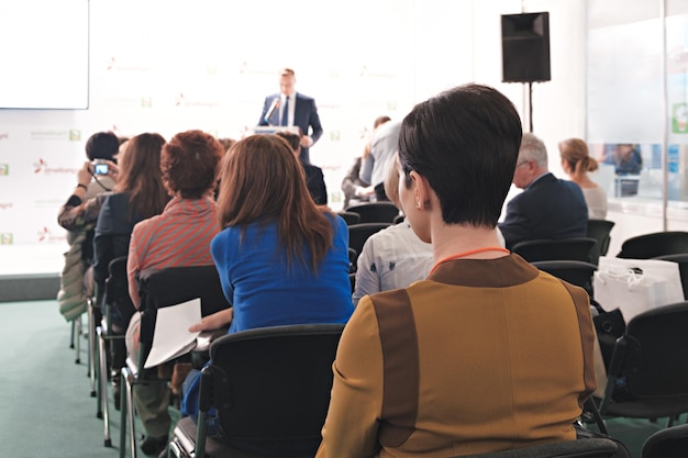 Business woman and people Listening on The Conference Horizontal Image