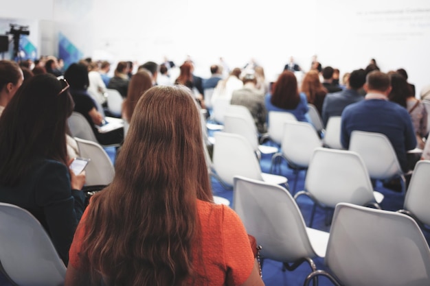 Business woman and people Listening on The Conference Horizontal Image