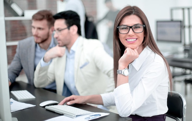 Business woman sitting at the office Desk