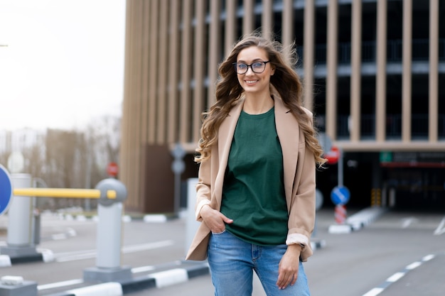 Business Woman Standing Near Indoor Parking Garage Caucasian Female Middle Age Woman in Glasses Outdoors Business Person