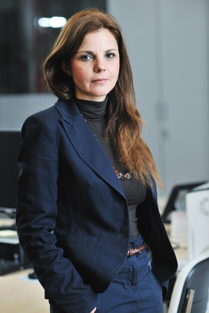 business woman in suit portrait in modern office