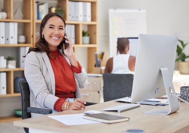 Business woman talking on phone call happy communication and conversation in startup agency Smile vision and creative asian designer entrepreneur and worker speaking in successful deal discussion