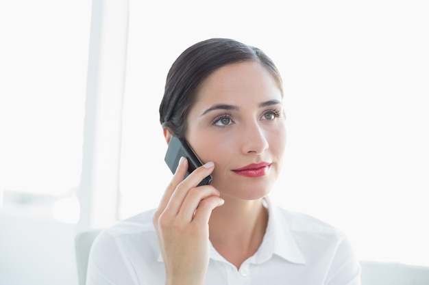 Business woman using mobile phone