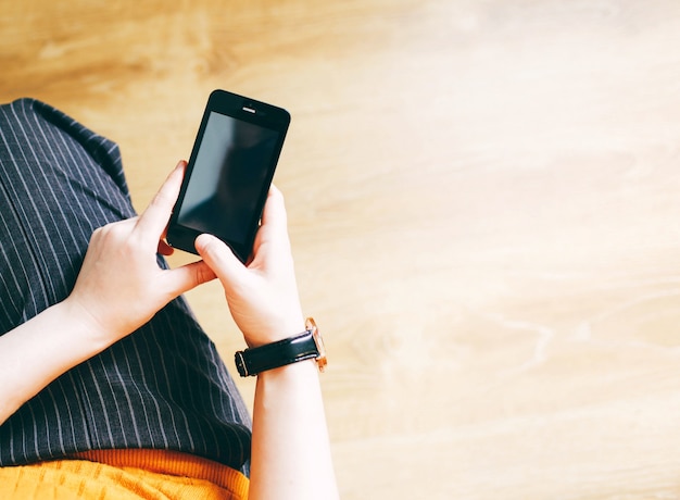 Business woman using smartphone