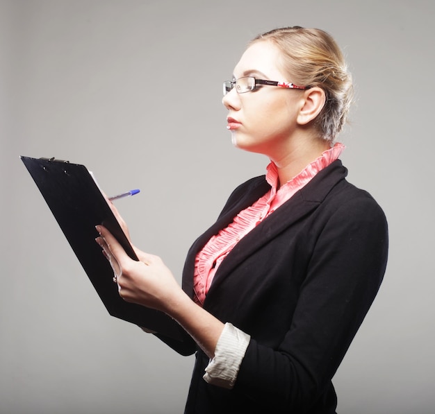 Business woman with clipboard